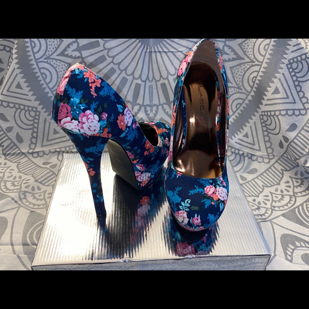 Floral heels. Never worn. Size 8.5-9